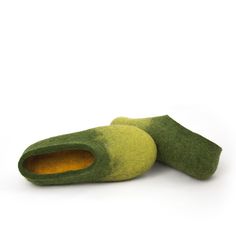 Felt slippers made in two shades of green sheep wool on the outside with yellow on the inside. These womens house shoes in ombre green will bring the freshness of spring inside your home. At Wooppers we make boiled wool slippers / wool clogs in environment conscious manner. Ours are health slippers that will massage your feet gently in a most comfortable way. Find more about the benefits of wearing Wooppers here----> https://www.etsy.com/shop/Wooppers?ref=hdr_shop_menu#about SIZES PLEASE INDI Comfortable Green Indoor Slippers, Comfortable Green Closed Toe Slippers, Green Slip-on Slippers With Soft Sole, Casual Green Slippers With Soft Sole, Wool Clogs, Wool Slippers, Felted Slippers, Boiled Wool, Green Ombre