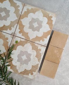 the tile is being laid out on the floor to be used as a planter