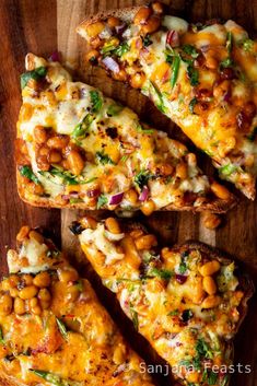 several pieces of pizza on a wooden cutting board