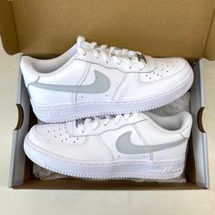 authentic white Nike Air Force 1 hand painted custom sneakers light gray swooshes on the insides and outsides of the sneakers All sneakers are made on order, please allow the indicated time for your item to be shipped. If you have any questions about the process time or do you need the sneakers quickly? Just send us a message!   * Be aware of your sneaker size, please in doubt go to the store first * Sneakers color may vary slightly due to photographic lighting and sources of your screen setting Black Air Force 1, Custom Sneakers Nike, White Nike Air Force 1, White Nike Air Force, Custom Nike Air Force, Nike Air Force 1 Custom, White Nike Air, Nike Air Force 1s, Air Force 1 Custom