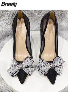 Glamorous Pointed Toe Heels With Bow, Banquet Heels For Party Season, Heels For Banquet And Party Season, Party Heels With Bow, Chic Wedding Shoes With Bow For Parties, Party Heels With Bow And Pointed Toe, Glamorous Wedding Shoes With Bow For Evening, Black Bow Heels For Wedding, High Heel Heels With Bow For Prom