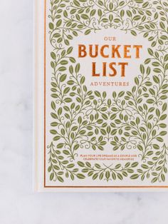 the bucket list book on a marble surface