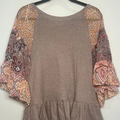 Beautiful Mocha Grey Boutique Top With Pattern Sleeves And Ruffle Bottom Brown Floral Print Tops For Fall, Brown Knit Top For Spring, Brown Cotton Knit Top For Spring, Umgee Tops, Mocha, Top Blouse, Womens Tops, Boutique, Grey