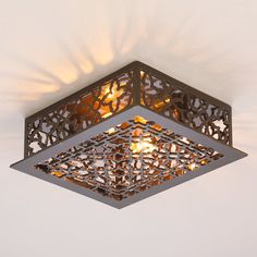 a square light fixture hanging from the ceiling