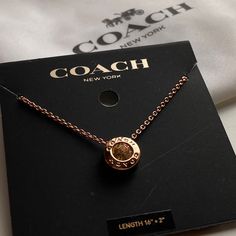 It’s New And Not Used. Color Rose Gold Material Metal Plated Brass And Glass Lobster Clasp Closure Adjustable 16" - 18" (L) Chic Coach Jewelry As Gift, Chic Coach Jewelry As A Gift, Coach Rose Gold Jewelry For Gifts, Circle Stone Necklace, Coach Necklace, Circle Necklaces, Script Necklace, Slider Necklace, Double Chain Necklace