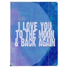 i love you to the moon and back again sign on wooden planks with blue background