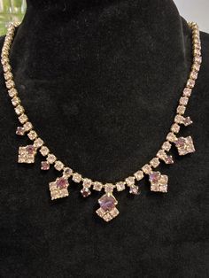 This is a delicate piece, I have photographed on black and white backgrounds so you can see the subtle pink stone colour. Necklace is in very good condition with all stones present and working ring pull clasp.  Will supply in new gift box.  An ideal gift for birthday, anniversary.  Formal evening event, sparkle with friends! Elegant Pink Rhinestone Formal Necklace, Antique Pink Jewelry For Formal Occasions, Formal Antique Pink Jewelry, Antique Pink Necklaces For Wedding, Antique Rhinestone Necklace Gift, Antique Rhinestone Necklace For Gift, Pink Rhinestone Costume Jewelry Necklace, Formal Gold Necklaces With Stone Setting, Pink Jeweled Rhinestone Costume Necklace