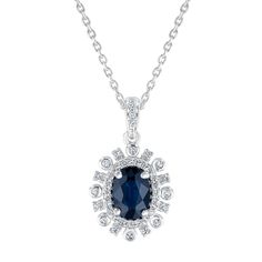 Crafted from 10k white gold, this stunning gemstone necklace is the perfect way to add a light, feminine touch to your look. Featuring a oval sapphire as the center stone, the pendant boasts round glittering diamonds that radiate out from its center creating a sunburst design. Diamonds are 1/6ctw, I in color, and I2 in clarity. The pendant measures 17mm in length and 11.5mm in width. An adjustable 16-17" white gold cable chain with a lobster claw clasp is included. Sapphire Oval Pendant Jewelry With Diamond Accents, Oval Sapphire Necklace With Halo Setting, Elegant Oval Necklace With Center Stone, Formal Oval Necklaces With Center Stone, Dazzling Sapphire Oval Jewelry, Sapphire Necklace With Oval Halo Setting, Dazzling Oval Sapphire Jewelry, Oval White Gold Necklace With Center Stone, Oval Lab-created Sapphire Jewelry With Halo Design