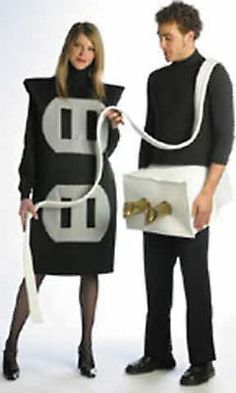 a man and woman dressed up in costumes with the letters b and d on them