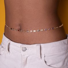 Delicate, simple, and perfect for everyday wear. Give your look a subtle upgrade with this classic belly chain. Materials: 18K Gold Plated, Cubic Zirconia, Brass Length: 25" Belly Chain with 3" extension chain (Sizes Available) *Hypoallergenic, Lead and Nickel Free, Tarnish Resistant Care: Our jewelry is designed to be water-resistant, so you don't have to worry about taking it off when you're near water. However, we recommend limiting prolonged exposure to water to keep your jewelry looking its Rainbow Prism, Belly Chain, Belly Rings, Purse Jewelry, Silver Plate, Cubic Zirconia, Everyday Wear, 18k Gold, Jewelry Accessories