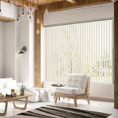 a living room filled with white furniture and windows covered in vertical blind blinds, along with a rug on the floor