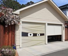 a garage with fake eyes painted on it