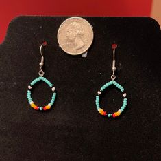 Small western teal beaded earrings, lightweight and hypoallergenic :) Handmade with seed beads and beading wire. Turquoise Beaded Teardrop Hoop Earrings, Turquoise Teardrop Earrings With Tiny Beads, Turquoise Earrings With Beaded Chain, Turquoise Earrings With Beaded Chain And Round Beads, Southwestern Turquoise Beaded Earrings, Southwestern Green Beaded Dangling Earrings, Adjustable Beaded Turquoise Teardrop Earrings, Southwestern Style Turquoise Beaded Earrings, Turquoise Dangle Beaded Earrings With Tiny Beads