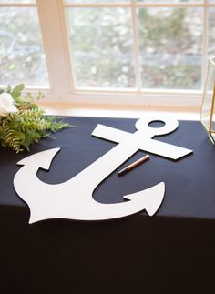 a table with an anchor cut out on it