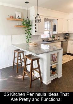 a kitchen with white cabinets and an island in the middle that has two stools on it