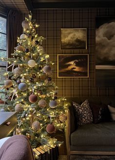 a decorated christmas tree in a living room