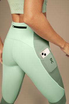 The performance-ready running tights with added storage for your phone, keys, and more – now in a 7/8 cropped length. Pair with your favorite On layers and trainers. More storage space. More security. Safely stow your card, keys or other essentials in the zipped back pocket. Plus, the roomy drop-in side pocket is perfect for keeping your phone handy for a post-run selfie. Always stay in your comfort zone by customizing your fit. And with the tights staying right where you want them by using the Cheap Stretch Activewear With Pockets, Luxury Compressive Leggings For Sports, Luxury Compression Activewear, Affordable Athleisure Tights For Gym, Luxury High Stretch Bottoms For Gym, Cheap Seamless Activewear For Training, Cheap Gray Activewear For Spring, Luxury Stretch Casual Leggings, Luxury Stretch Full-length Leggings