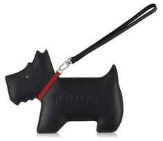 a black dog leash holder with the word raduby on it's side