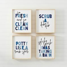 four framed art pieces with the words scrub and clean in different font styles on them