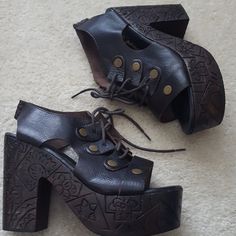 Excellent Condition, Worn Only A Few Hours, So Only Evidence Of Wear Is Soles Aren't Brand New. Dark Brown With Antiqued Gold/Brass Accent. Lace Front Leather With Carved Wooden Clog Platform. 3" Heel + 2" Platform = 5" Total. Great 70's Vibe. Great With Flares, Crochet, Fringe Or Gunne Sax For Real Vintage Look. *No Offers Please.* Festival Platform Heels With Round Toe, Synthetic Block Heels With Rubber Sole, Synthetic Block Heel Heels With Rubber Sole, Festival Platform Sandals With Round Toe, Platform Sandals With Round Toe For Festival, Festival High Heel Platform Heels, Spring Festival Heels With Round Toe, Vintage Summer Clogs With Block Heel, Leather High Heel Sandals For Festivals