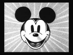 mickey mouse's face is shown in black and white