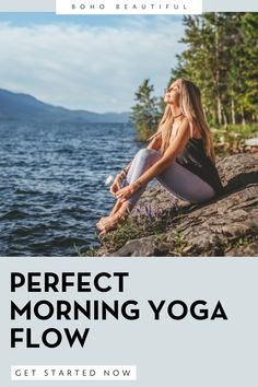 a woman sitting on the edge of a lake with her legs crossed in yoga poses