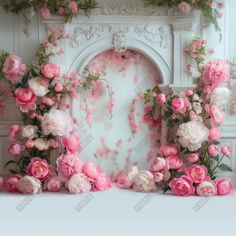 pink and white flowers are arranged around an arch