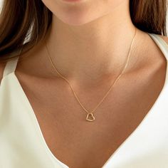 ✥ Embrace love and elegance with our Heart Shape Diamond Moissanite Necklace in 14K Yellow Gold, a stunning piece that captures the essence of romance. This exquisite necklace features a heart-shaped pendant crafted from shimmering diamonds and moissanite stones, set in a warm 14K yellow gold setting. The heart symbolizes love and affection, making this necklace a perfect gift for a loved one or a meaningful addition to your own collection. The pendant hangs gracefully from a delicate yellow gold chain, adding a touch of sophistication to any outfit. Whether worn for a special occasion or as an everyday accessory, this Heart Shape Diamond Moissanite Necklace is sure to be cherished for its beauty and sentiment. ✦ Main Stone Details✧ Shape: Round Moissanite✧ Stone Size Options: 0.14ct✧ No. Heart Shape Necklace, Gold Diamond Heart Necklace, Mens Diamond Wedding Bands, Moissanite Necklace, Heart Necklace Diamond, Moissanite Earrings, Yellow Gold Setting, Heart Shaped Diamond, Moissanite Wedding Bands