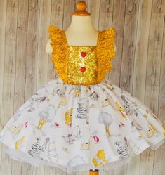 Winnie The Pooh Dress perfect for a birthday party or any occasion. Girls size 12-18 mo. 18- 24 mo. 2T 3T 4T 5T 6 7 8 I use an underskirt just to show how puffy is the dress. if you want a puffy look you will need to buy a under skirt and it sold separately. Please leave me a note with the following instructions. *Size Whimsical Princess Dress With Ruffles For Dress-up, Playful Easter Dress-up Dresses, Playful Fitted Princess Dress With Ruffles, Playful Fitted Ruffled Princess Dress, Cute Sleeveless Tutu Dress For Pageants, Cute Sleeveless Tutu Dress For Pageant, Playful Ruffle Princess Dress For Dress-up, Playful Ruffled Tutu Dress For Dress-up, Playful Ruffled Princess Dress For Dress-up