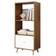 a bookcase with two drawers and books on top of each shelf in front of a white background