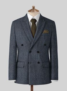 Still stuck for inspiration on how to incorporate tweed into your wardrobe? Look no further and try our Harris Tweed Wide Herringbone Blue suit. Crafted from pure wool, the suit offers comfort and enough warmth to help you fight the chilly climate with ease also the outfit hue will keep you looking stylish for any occasion day or night. For an elegant ensemble pair it with a white shirt, black tie and tan oxford shoes.   Look Includes  Harris Tweed Wide Herringbone Blue Fabric  Double Breasted J Luxury Tailored Tweed Jacket With Herringbone Pattern, Luxury Blue Tweed Jacket For Winter, Herringbone Tweed Jacket For Business, Wool Tweed Jacket With Herringbone Pattern For Business Casual, Timeless Tweed Jacket With Herringbone Pattern For Business, Timeless Business Tweed Jacket With Herringbone Pattern, Luxury Tweed Jacket With Herringbone Pattern For Business, Elegant Tweed Suits For Winter, Wool Herringbone Tweed Jacket For Business Casual