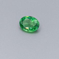 Say "Tsavorite" -- it's named for the mine where it was discovered in Tsavo, Kenya. The brilliant fire and intense green color are captured perfectly in this classic oval cut. The generous carat-size would lend itself to an impressive ring for a second wedding anniversary or a January birthday. Especially explosive when matched with white diamonds in white gold -- call us to discuss and design.Gemstone Details Identification: Natural Garnet Carat: 3.21 Carats Shape: Oval Color: Green Measurement Oval Green Gemstones For Formal Occasions, Classic Oval Tsavorite Emerald Ring, Oval Green Tsavorite Jewelry, Gia Certified Oval Green Gemstones, Gia Certified Green Oval Emerald Ring, Gia Certified Oval Green Emerald Ring, Gia Certified Oval Emerald Ring, Second Wedding Anniversary, Second Wedding