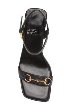 A classic, goldtone horsebit accents the slender vamp strap of this sandal lofted by a sturdy block heel. 3 1/2" heel (size 8.5) Leather upper/leather and synthetic lining/synthetic sole Imported Shoe Wedges, Black Heel Sandals, Jeffrey Campbell Sandals, Cheap Sandals, Fab Shoes, Clothing Optional, Fancy Shoes, Black Heel, Black Sandals Heels