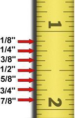 a yellow and red measuring ruler with the words, 1 / 8 inches on it