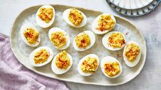 deviled eggs are arranged on a platter