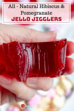 someone holding some jelly in their hand with the text all natural hibiscus & pomegranate jello jugglers