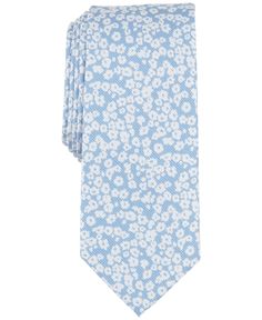 a blue tie with white flowers on it