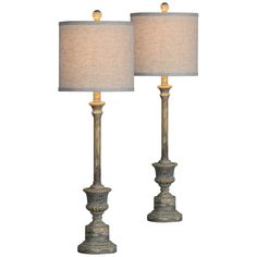 a pair of lamps sitting next to each other