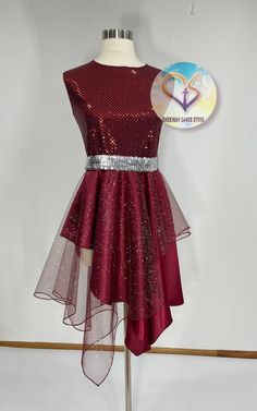 a red dress with silver sequins on the waist and back, sitting on a mannequin