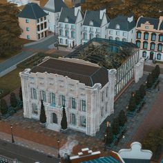 an aerial view of a large white building