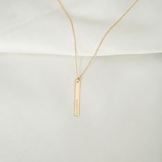 "Get her the 14k gold bar name necklace and let her know you would go the extra mile for her. It is perfect for engraving and is available in yellow or rose gold, or white gold. D E T A I L S * 100% 14k Solid Gold * Choice of Gold Color: Yellow Gold, Rose Gold, White Gold * Pendant Height: 25 mm/1 inch * Pendant Width: 4 mm/0.15 inch * Length: 14\", 16\", 18\", 20\", 22\" (Got a little note that can help you in the photos.) * Ready to Ship in 1-3 Business Days * 100% US sourced Got something you Minimalist Gold Nameplate Bar Necklace, Minimalist 14k Gold Name Necklace For Personalized Gift, 14k Gold Jewelry With Engraved Text, Minimalist 14k Gold Name Necklace Personalized Gift, Minimalist Jewelry With Engraved Text For Everyday Use, Everyday Rectangular Jewelry With Engraved Text, Minimalist Everyday Jewelry With Engraved Text, Personalized Gold Bar Necklace Minimalist Style, Minimalist Gold Engraved Name Necklace