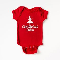 The perfect bodysuit for your perfect baby! These short sleeve bodysuits have 3 snap closure and double needle ribbed binding on neck, shoulders, sleeves, and leg openings. Machine wash cold, inside out. Air dry or tumble dry low. Christmas Baby Onesie, Baby Christmas Onesie, Pink Kelly, Christmas Bodysuit, Christmas Onesie, Hodge Podge, One Piece Clothing, Cricut Craft, Baby Boy Onesies