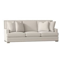 an image of a couch with pillows on it's back and the seat upholstered