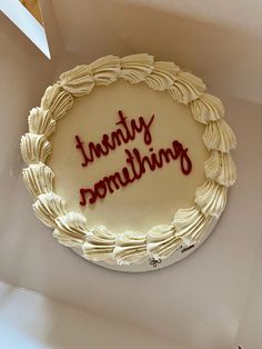 there is a cake with writing on it