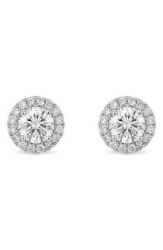 These stunning stud earrings are crafted with a center lab-grown diamond and halo all set in 14-karat gold. Total lab-grown-diamond weight: 1.0ct.   Color: G–J   Clarity: VS   14k gold/lab-grown diamond   Imported   >Diamond Guide Halo Stud Earrings, Halo Earrings Studs, Diamond Guide, Diamond Halo, Lab Created Diamonds, 1 Carat, Diamond Studs, Halo Diamond, Fashion Earrings