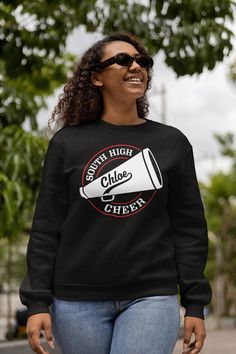 Personalized Cheer Shirt. This design can be customized with your text, team/school name and colors. Ask about group pricing! See Size Charts in the photos for sizing. Printed on a Black Heavyweight Crew Neck Sweatshirt Features: 8 oz./yd² (US) 13.3 oz./L yd (CA), 50/50 cotton/polyester, 20 singles Heather Sport colors: 60/40 polyester/cotton 2-end midweight fleece fabric Classic fit Air jet yarn for softer feel and reduced pilling Double-needle stitching at shoulders, armholes, neck, waistband Team-colored Crew Neck T-shirt For Cheerleading, Black Fan Apparel T-shirt For Cheerleading, Black Collegiate T-shirt For Cheerleading, Black T-shirt For Cheerleading Fan Apparel, Crew Neck Tops For Cheerleading During Sports Season, Crew Neck Tops For Cheerleading Sports Season, Black Crew Neck T-shirt For Cheerleading, Black School Spirit Sweatshirt For Cheerleading, School Spirit Sublimation Crew Neck For Sports Season