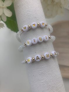 Single bracelet | 14k gold filled beaded bracelet | 4mm gold filled beads | 4mm natural moonstone beads | white and gold letter/number beads | elastic beaded bra meet | please include custom word, initials, numbers in notes to seller Dainty White Name Bracelet For Everyday, Dainty Letter Beads Beaded Bracelets For Birthday, Dainty Beaded Bracelets With Letter Beads For Birthday, Dainty Letter Beads Bracelet For Birthday, Dainty White Beaded Bracelets With Letter Beads, White Beaded Bracelets With Letter Beads For Personalized Gift, White Beaded Bracelet With Tiny Beads For Birthday, White Beaded Bracelets With Tiny Beads For Birthday, Dainty Name Bracelet With White Round Beads