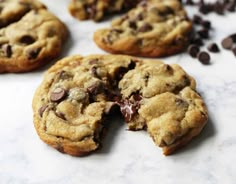 chocolate chip cookies are cut in half on a table