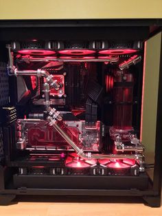 the inside of a computer case with red lights