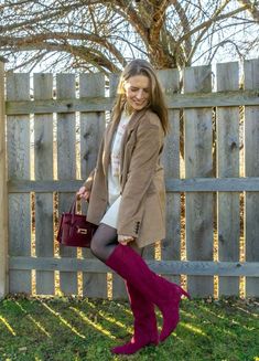 Want to incorporate burgundy boots into your winter wardrobe? Pair them with a matching burgundy purse to create a bold and cohesive look. These burgundy accessories add a pop of color and elegance to any outfit. Check out more ways to style burgundy boots and purses this season.